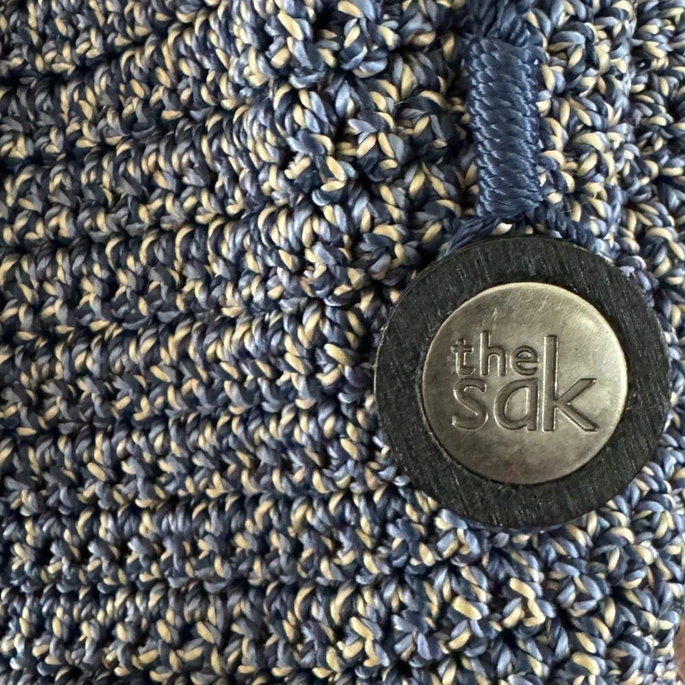 The Sak Brown & Navy Woven Backpack with Tassel Fringe and Embroidered Strap